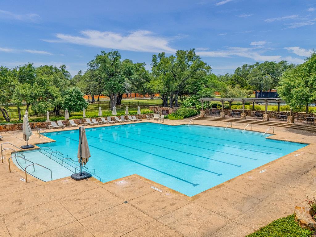 Cimarron Hills community lap pool with oak trees