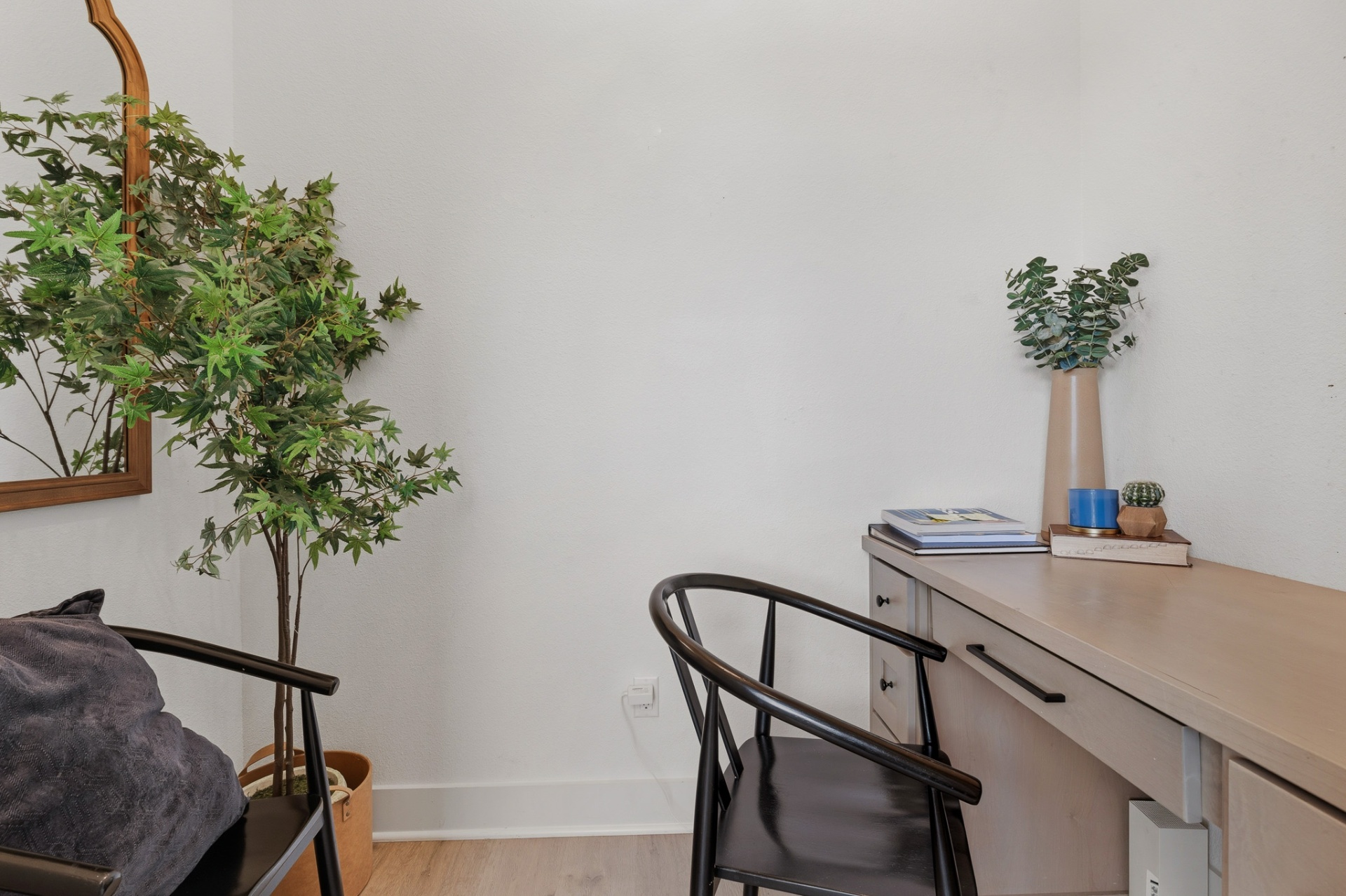 Study nook with tan shaker desk, wishbone chairs and Japanese maple indoor tree